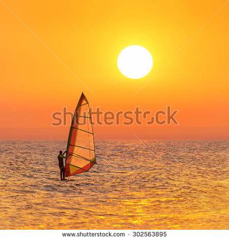 Obraz windsurfing o zachodzie słońca